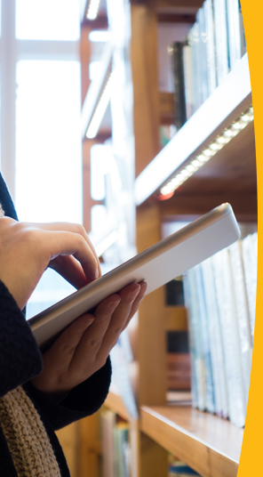 Someone consulting the Library content both in person and through the website.