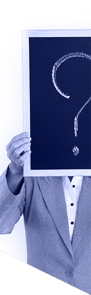 Person holding a chalkboard with a question mark written on it in front of their face