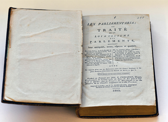 old open book, title page visible